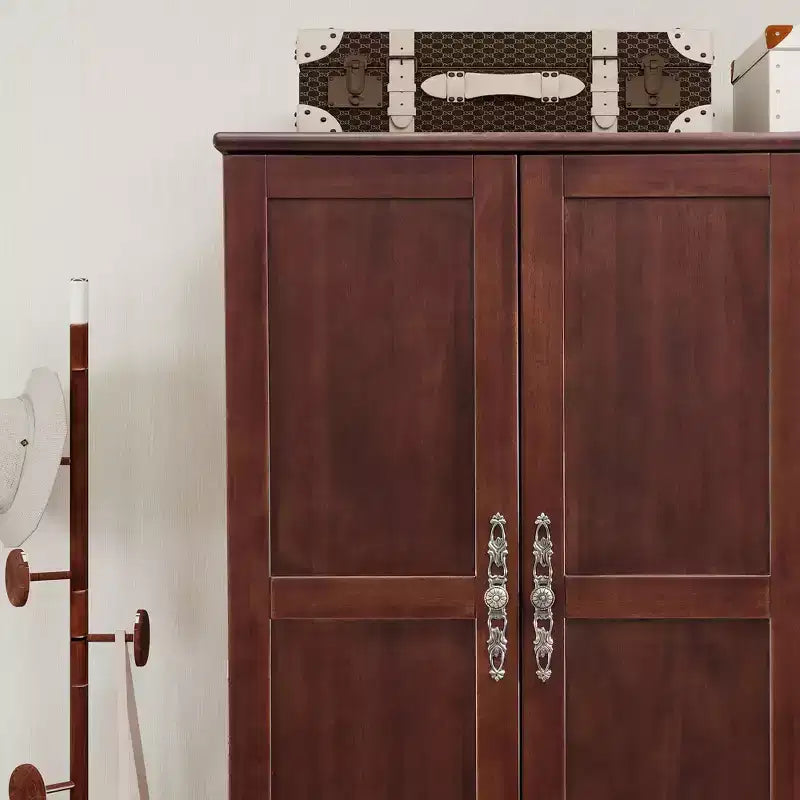 Armoire de 117,6 cm en bois jaune brunâtre avec 2 tiroirs, une tringle de suspension et des étagères